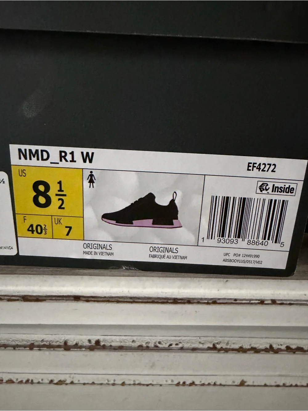 Women’s Adidas NMD R1 ‘Black True Pink’ sneakers.